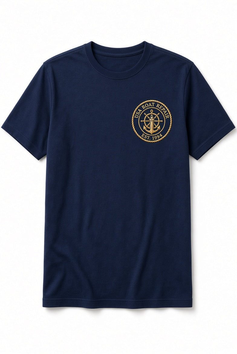 USA Boat Repair navy t-shirt with gold embroidered nautical patch on left chest