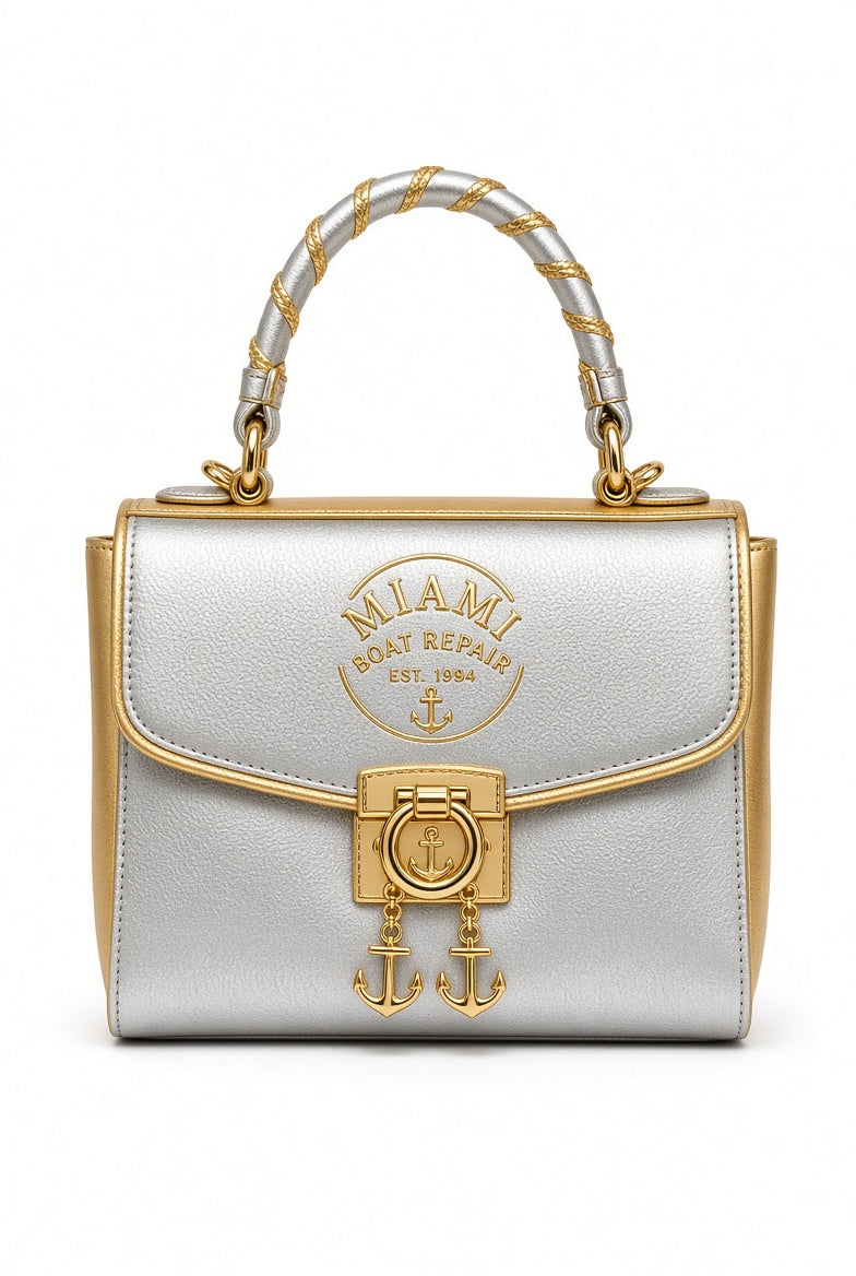 Miami Boat Repair Two-Tone Silver and Gold Top Handle Bag with rope handle and anchor clasp