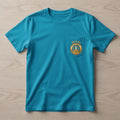 Miami Yacht Club turquoise pocket t-shirt front with gold MIAMI lettering and gold chest pocket crest logo