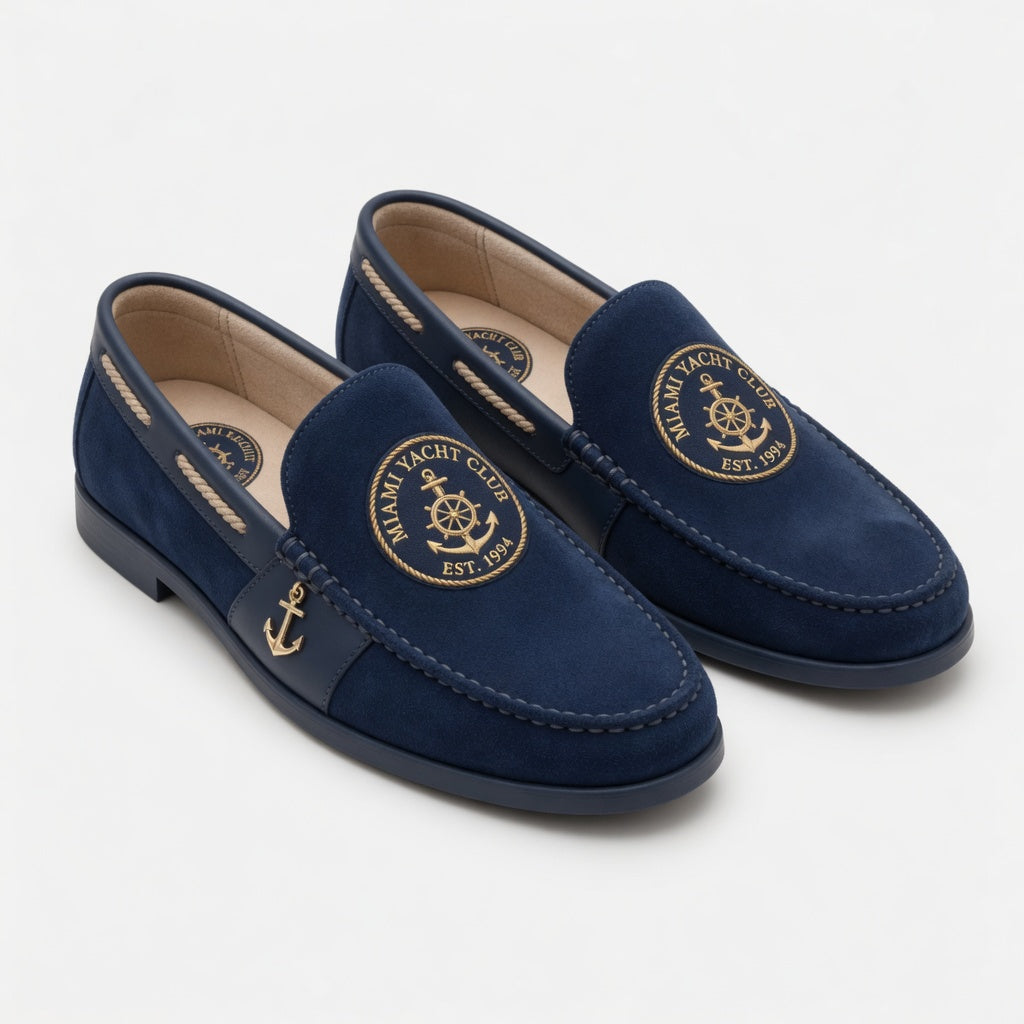 Miami Yacht Club deep navy suede nautical loafer with gold embroidered anchor medallion and gold anchor charm