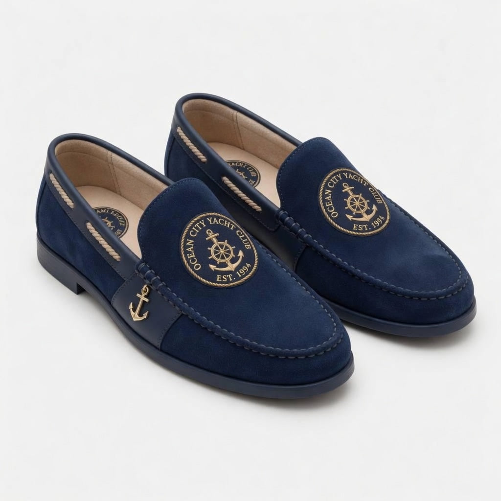 Ocean City Yacht Club deep navy suede nautical loafer with gold embroidered anchor medallion and gold anchor charm