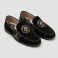 USA Yacht Club black suede nautical loafer with embroidered American flag anchor medallion and gold anchor charm