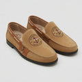 Annapolis Yacht Club sand suede nautical loafer with cognac trim and tone-blended anchor medallion crest