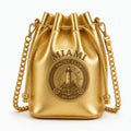 Gold metallic bucket bag with Miami Yacht Club nautical medallion, chain strap, Est. 1994