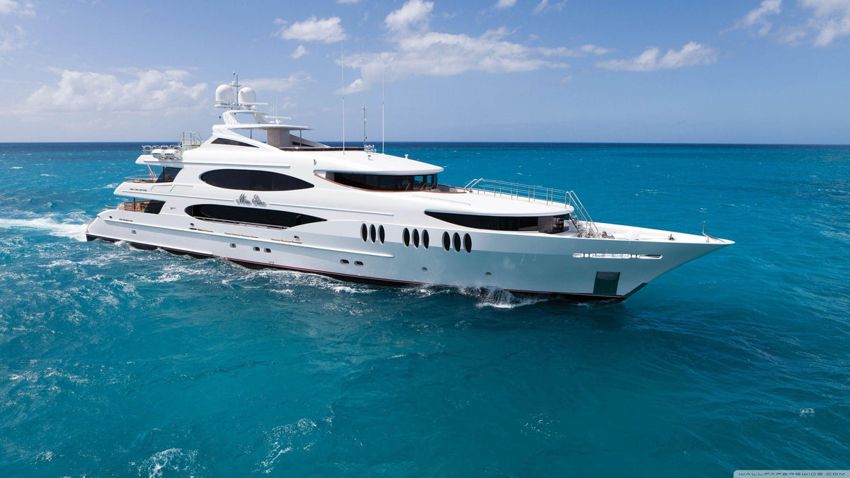 Yacht Club Collection hero yacht at sea